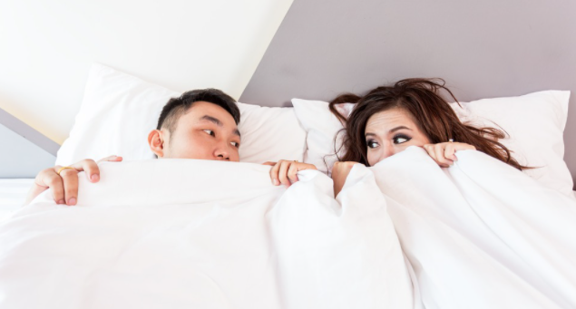 Couple Lying Bed